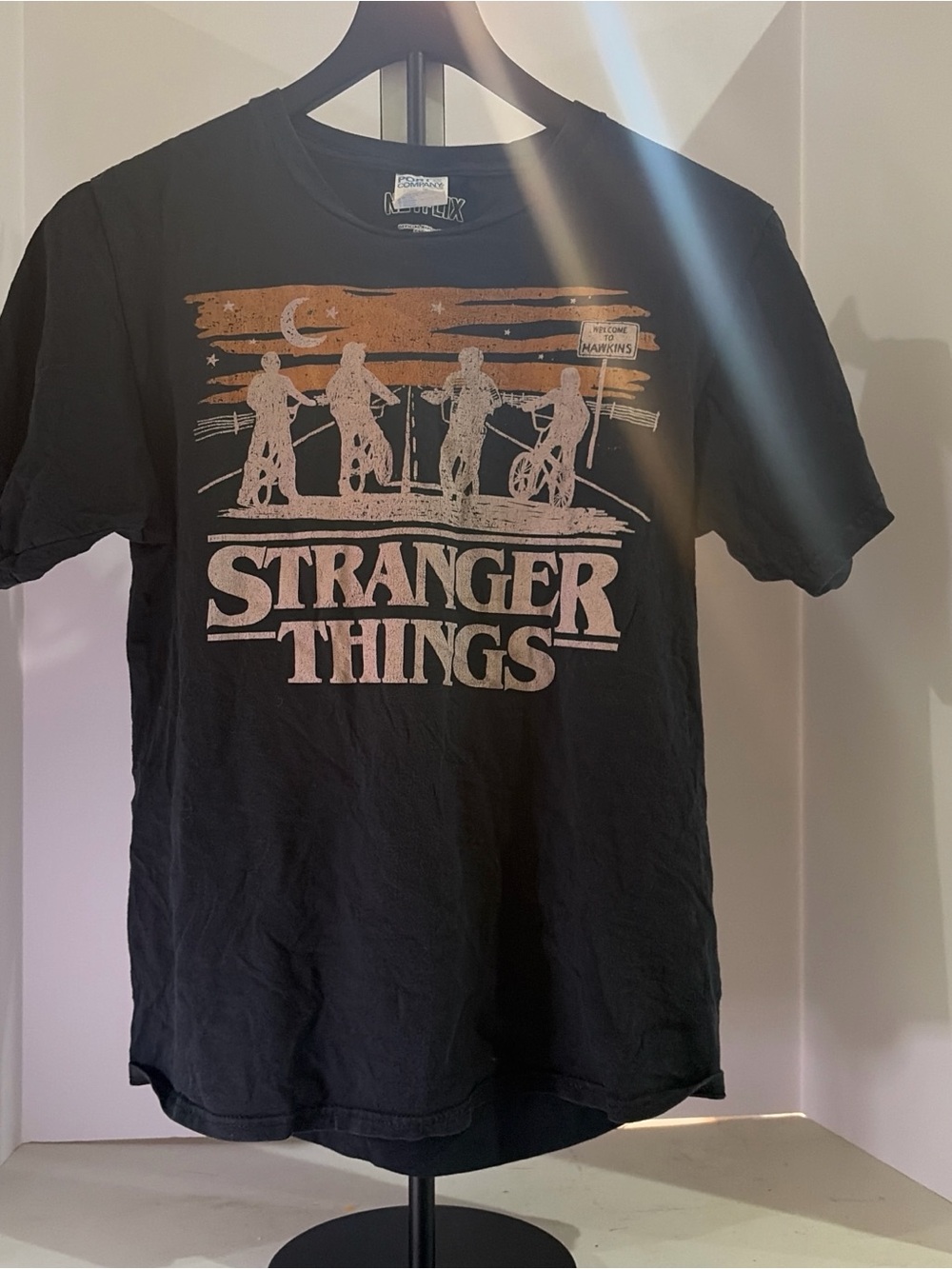 Netflix Stranger Things Black Tee with Orange & Cream Graphic